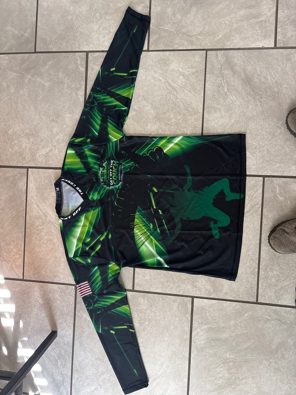 Get Off The Couch Productions long sleeve jersey in green - front