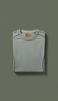 Men's technical performance t-shirt, Default angle: straight-on macro 3/4 or orthogonal flat lay focusing tightly on one...