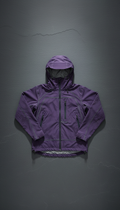 Photograph a lightweight jacket on a clean, urban slate backdrop. The jacket is perfectly centered, with soft, shadowless...