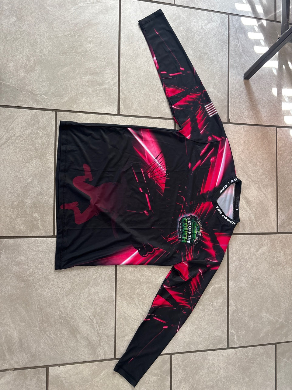 Get Off The Couch Productions long sleeve jersey in pink - front