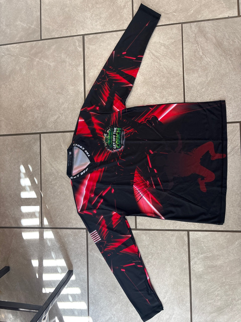 Get Off The Couch Productions long sleeve jersey in red - front