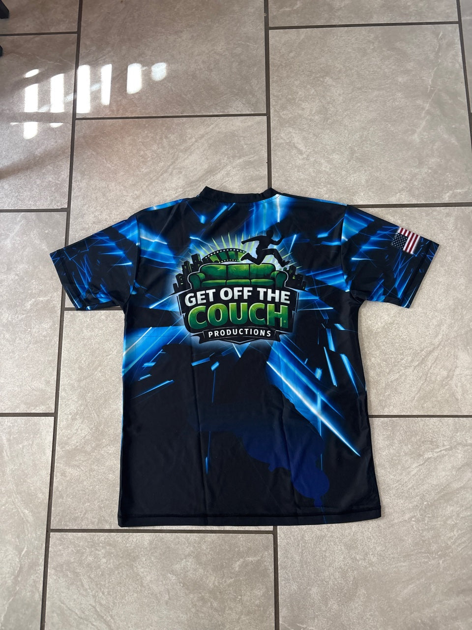 Get Off The Couch Productions short sleeve shirt in blue - back