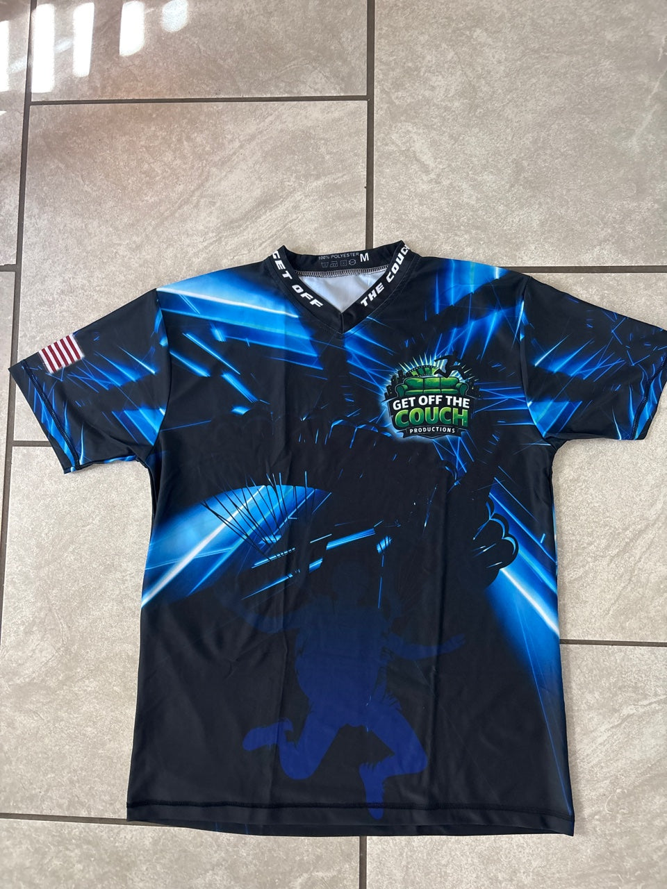 Get Off The Couch Productions short sleeve shirt in blue - front